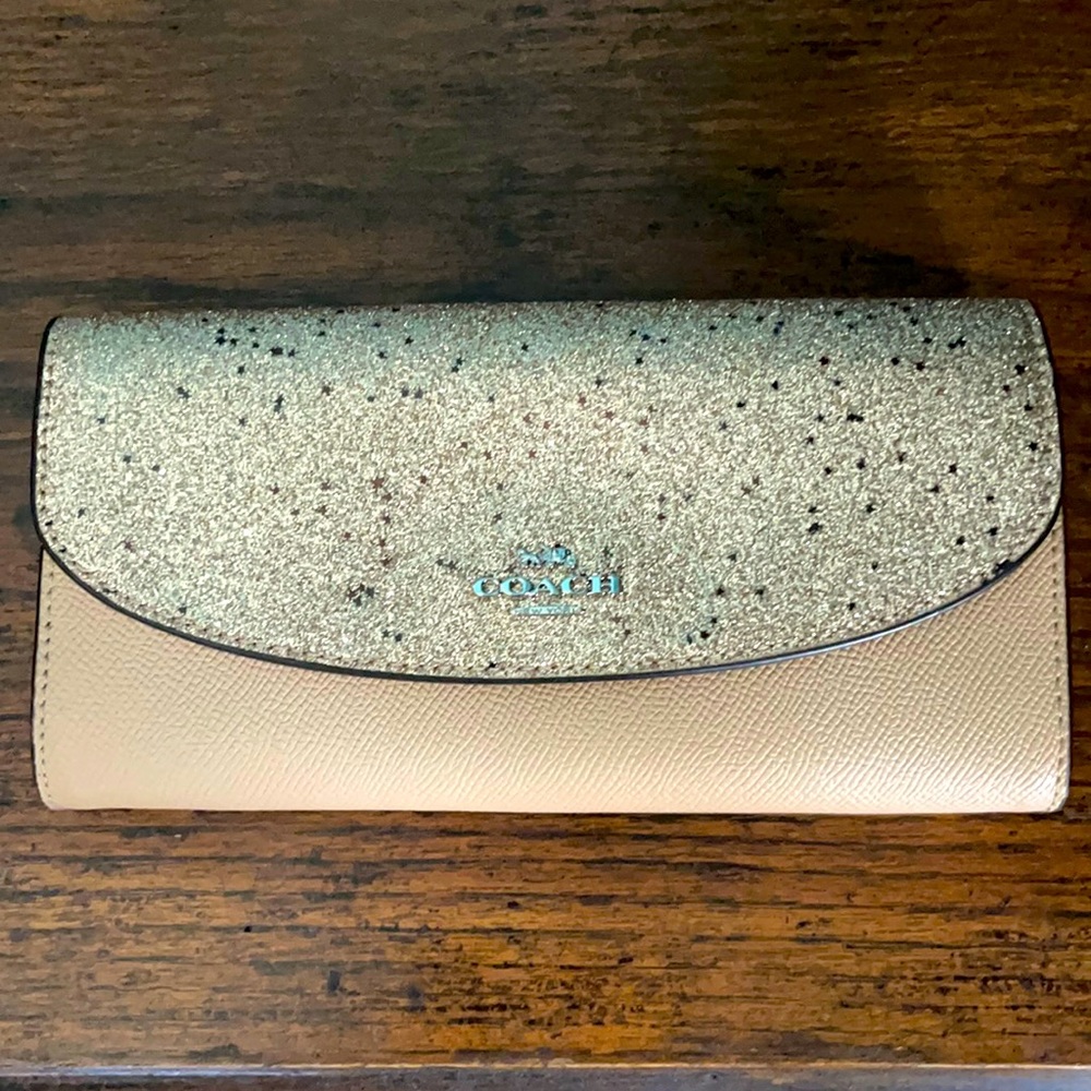 New never used Coach wallet peach with a sparkle!